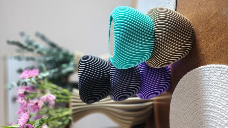 Colorful swirl bowls — turquoise, purple, black, gold