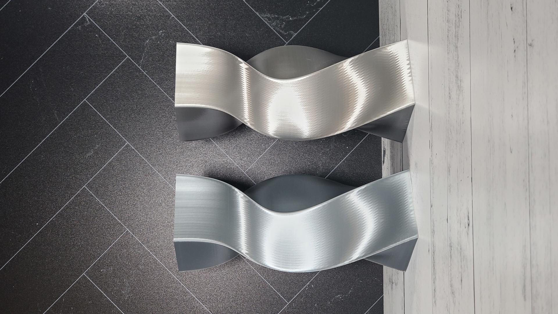 Silver twisted vases